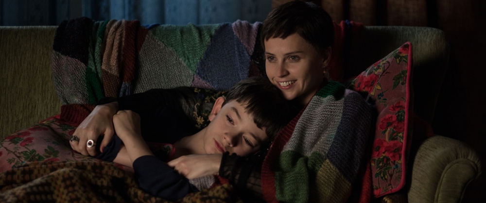 Lewis MacDougall as Conor O'Malley and Felicity Jones as Lizzie Clayton.